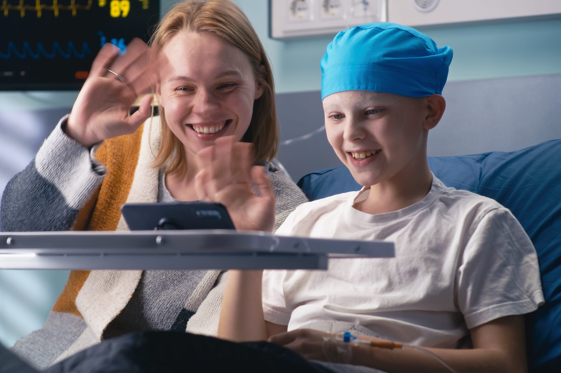Cheerful,Woman,And,Boy,Smiling,And,Talking,With,Relatives,Online